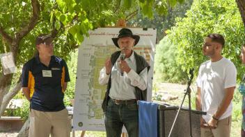 Baggins End Domes builder Ron Swenson, offering impromptu remarks