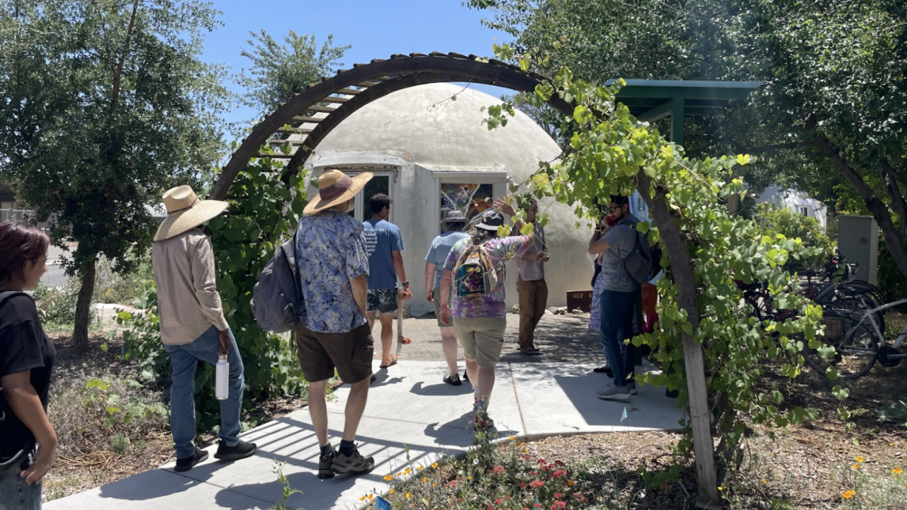 Showcase guests gathered at the corner of the Domes at the newly improved North Entrance