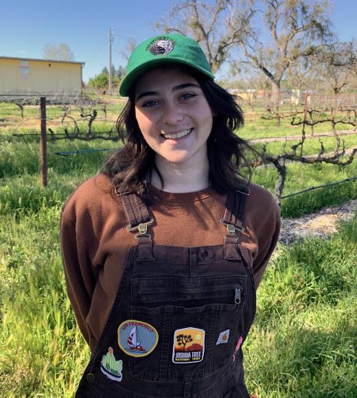 Adiella Kessler standing at the Student Farm