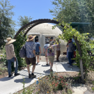 Showcase guests gathered at the corner of the Domes at the newly improved North Entrance
